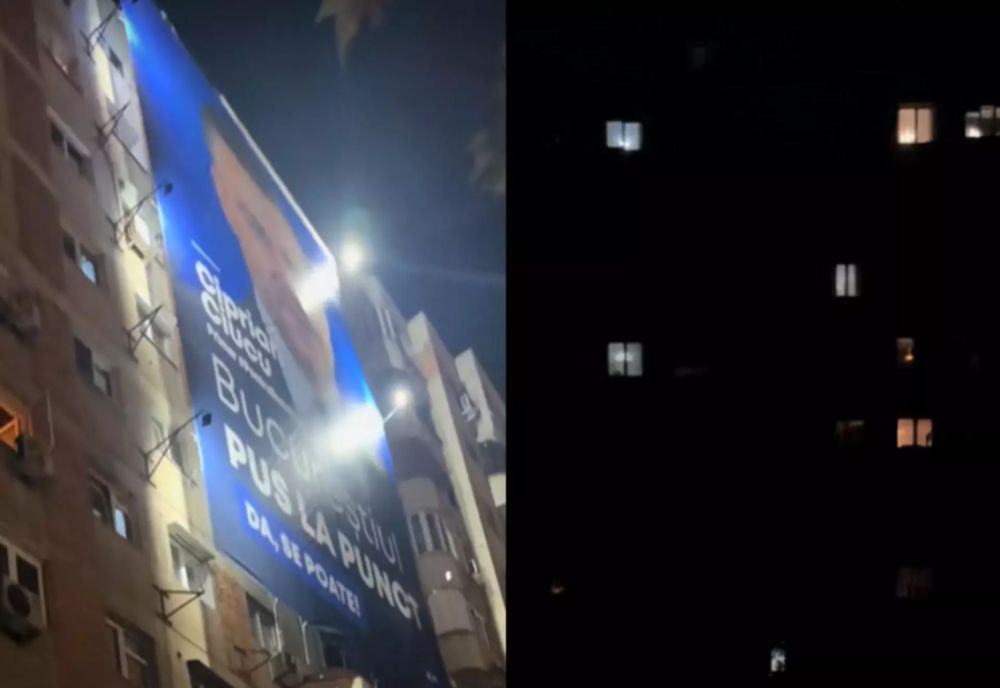 Bucureștenii, revoltați de banii pompați în campanie. Afișul cu Ciucu, luminat puternic, în spatele blocului, beznă
